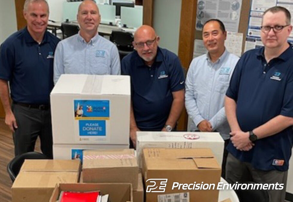 Precision Environments Donates School Supplies to Crayons to Computers 