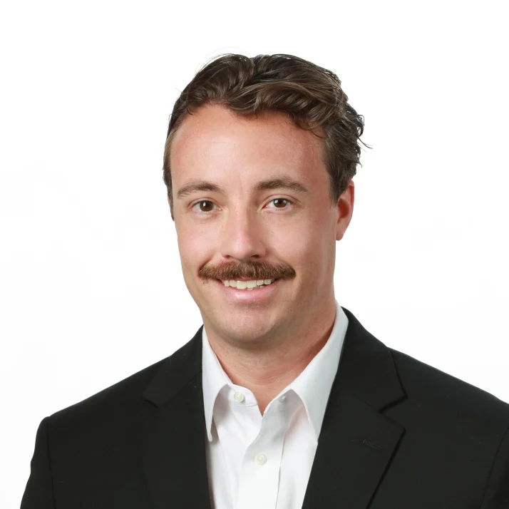 Professional headshot of Alex Gnaegy, a technical sales expert at Precision Environments.
